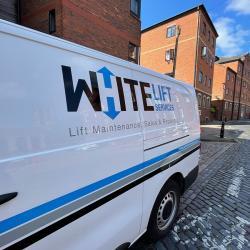 White Lift Service Van